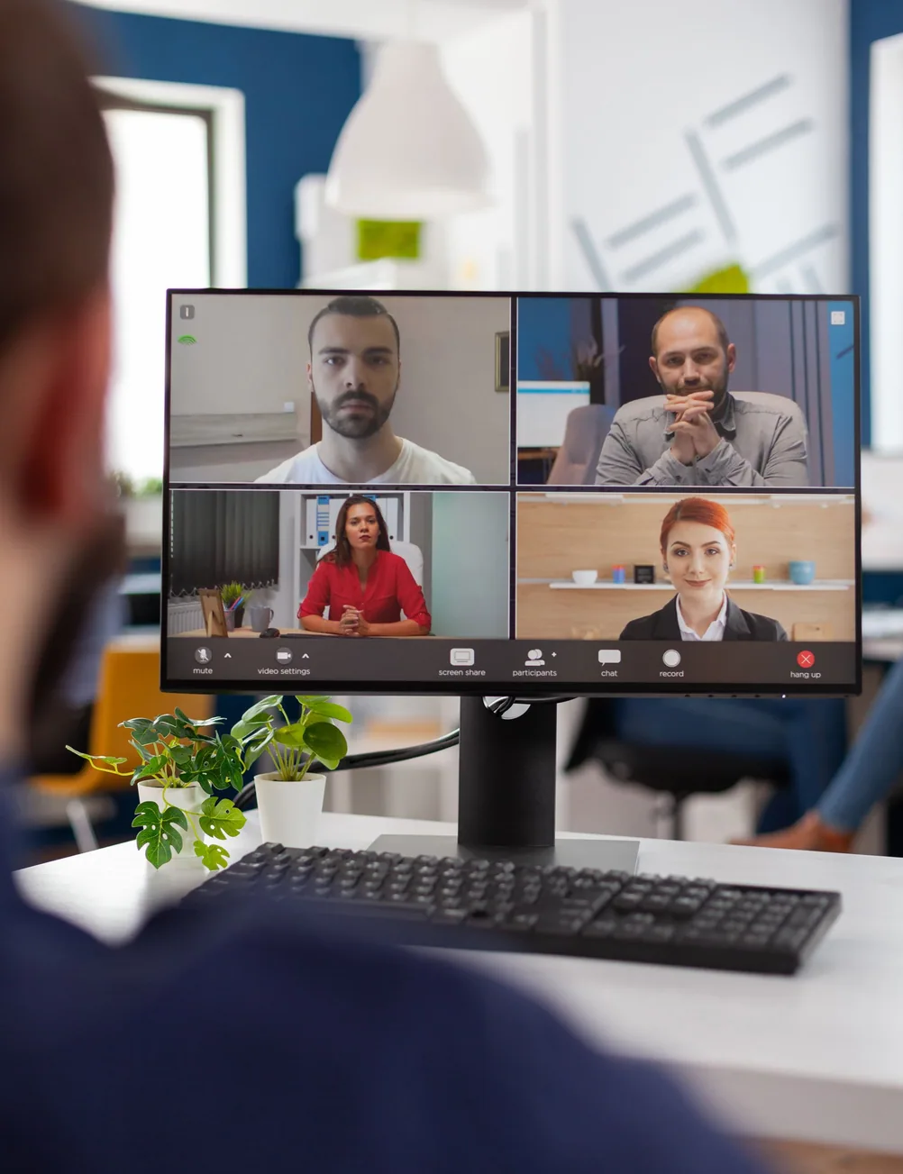 A Green Growth Advisory board meeting on a laptop, with advisors on video